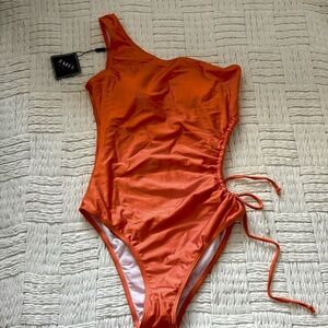 ZAFUL Cut Out One Shoulder Shiny Cinched One-piece Swimsuit - Orange Medium
